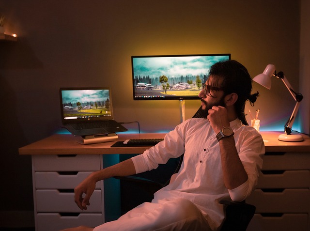 man sitting in his office pondering