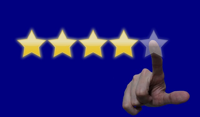 hand pointing at star review
