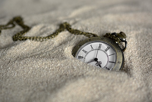 pocket watch in the sand